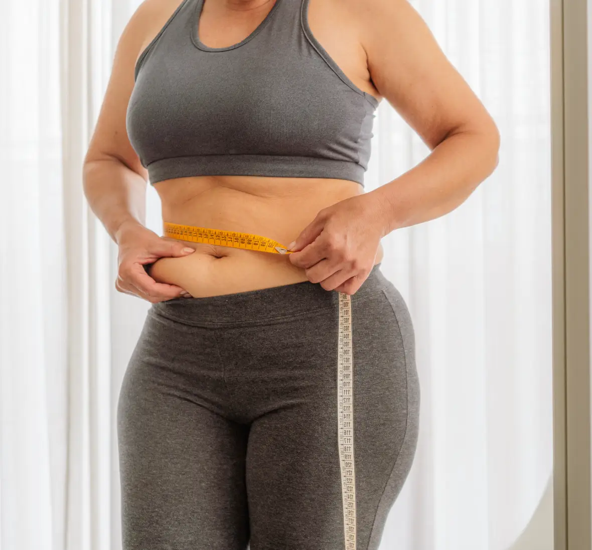 Measuring waist for fitness progress