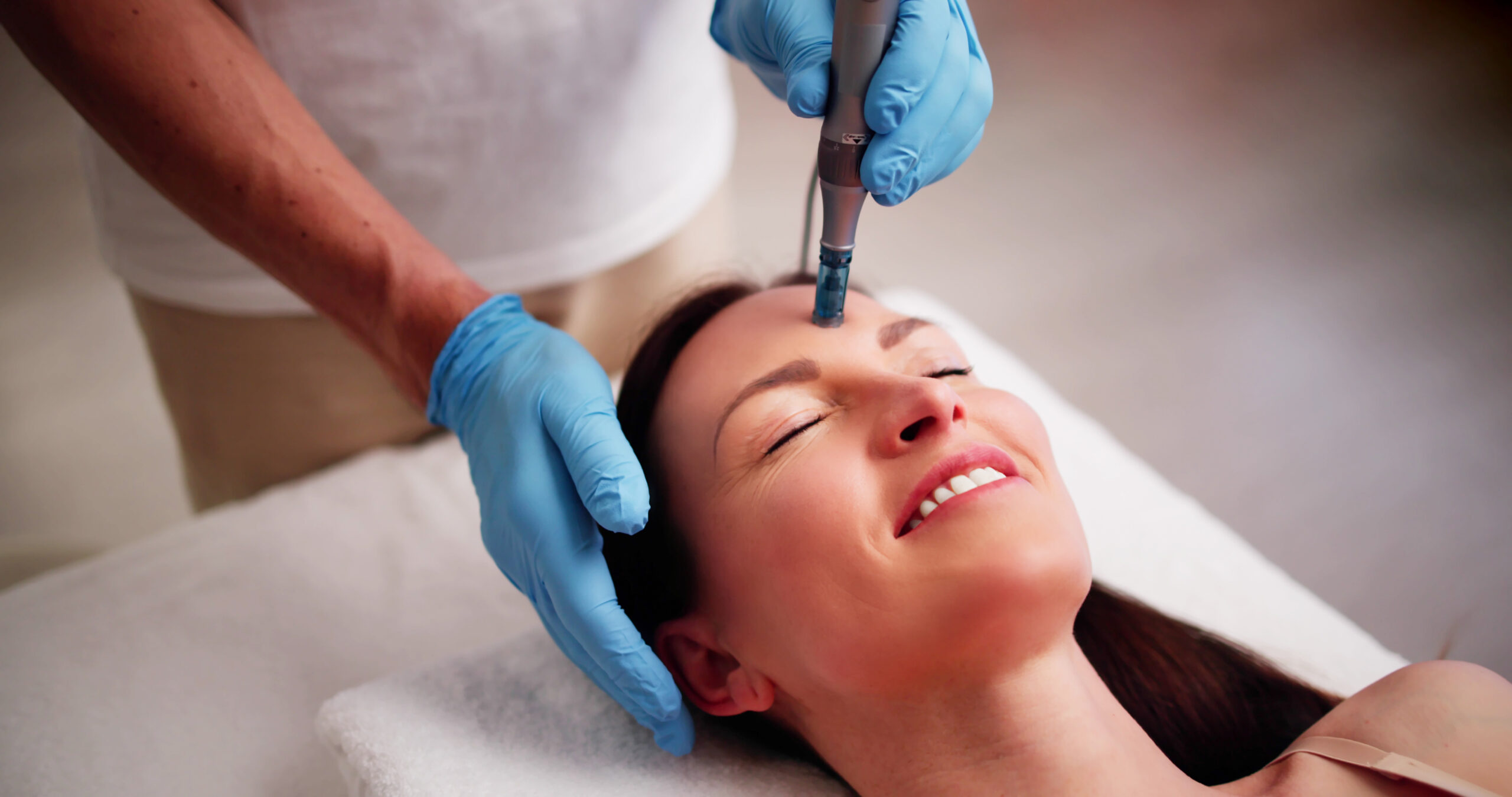 Woman receiving skincare treatment at spa